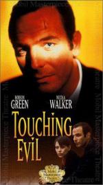 Touching Evil: 265x475 / 31 Кб